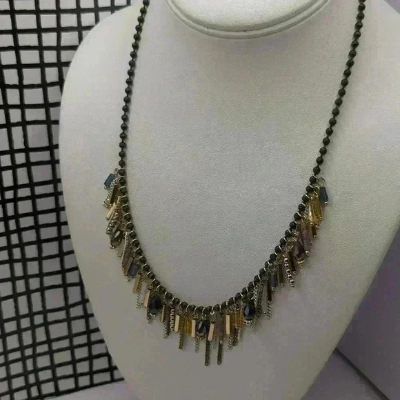 Premier Jewelry necklace with dark beads and gold, purple and white dangles. - Picture 2 of 4